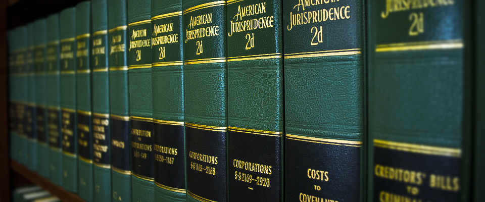 Row of green American Jurisprudence law books